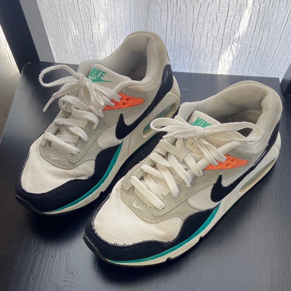 Nike Black and White Sneakers with Orange Highlights